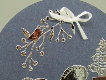 Weihnachten Grußkarte rund Schaukelpferd Detail Schleife Vogel blau