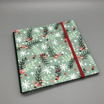 Buch Gummiband Faltbuch Front grün rot Zweige Schneeflocken