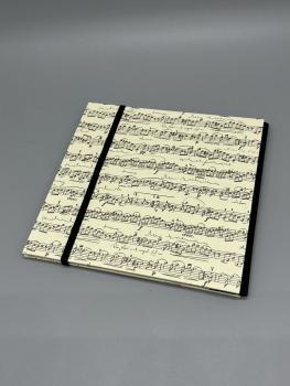 Fotoalbum Buch schwarz Musiknoten Rücken Gummiband