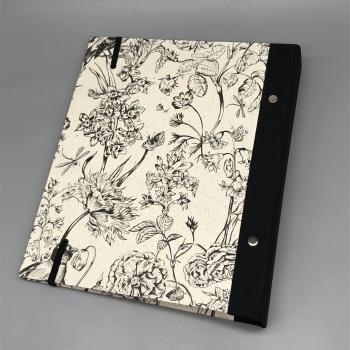 Buch Ringmechanik Blumen schwarz Rückendeckel