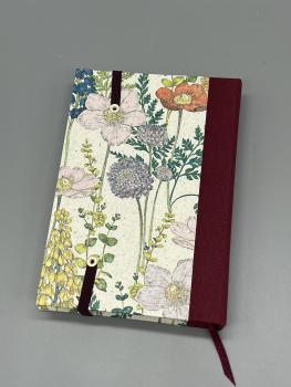 Preview: Buch Leinenrücken  Blüten bunt rot handgebunden Rückseite