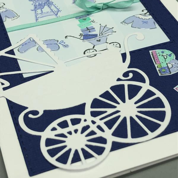 Grußkarte Geburt blau Kinderwagen Stanzteil weiß