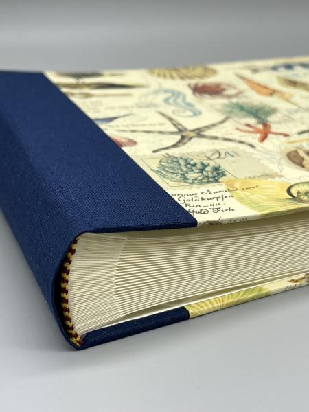 Fotoalbum 15×21 cm quer Marina – Detail blauer Leinenrücken, handgebunden in Mühltal