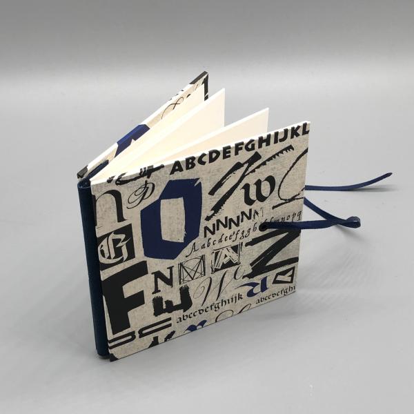 Buch Satinband Rückseite Fotos Faltbuch Buchstaben