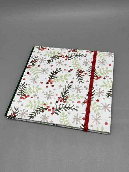 Buch Gummiband Faltbuch Front weiß rot Zweige Schneeflocken