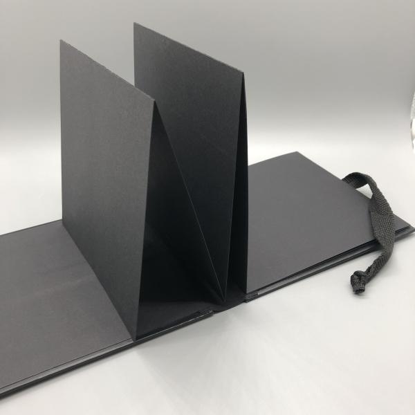 Fotoalbum Buch schwarz Seiten Faltung Innenseite