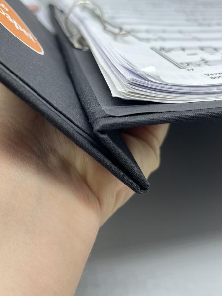 Ordner Buch Mappe schwarz Rücken Handhabung Halten Gebrauch