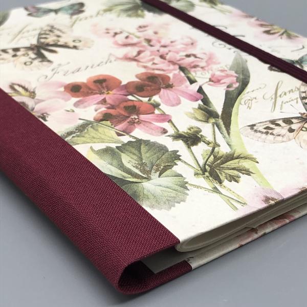 Notizen A6 auswechselbar Heft rot Blumen Detail Bindung Leinenrücken