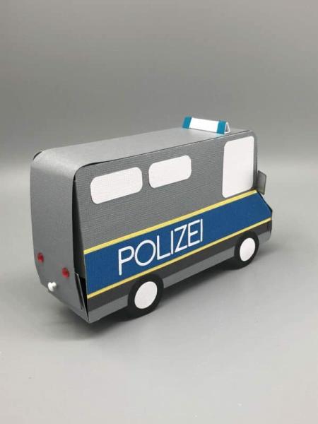 Geschenkschachtel Verpackung Gutschein Symbol Notfallfahrzeug Polizei Seite