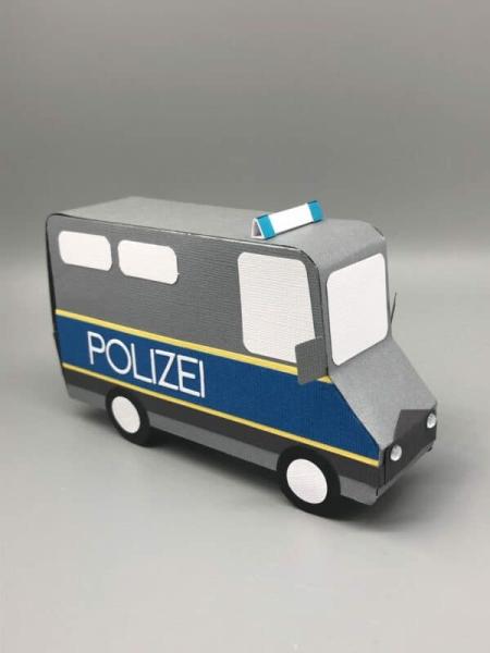 Geschenkschachtel Verpackung Gutschein Symbol Notfallfahrzeug Polizei Front